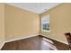 Bright bedroom with hardwood floors and a window that lets in plenty of natural light at 174 Seville Dr., Murrells Inlet, SC 29576