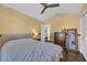 Warm bedroom with a ceiling fan and a large bed at 174 Seville Dr., Murrells Inlet, SC 29576
