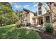 Comfortable patio with grill, table, chairs and view of home's backyard at 19 Pistachio Loop # G, Murrells Inlet, SC 29576