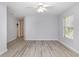 Spacious bedroom with natural light, ceiling fan, and closet access at 19 Pistachio Loop # G, Murrells Inlet, SC 29576