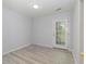 Sunlit bonus room with glass-paneled door to the outdoors at 19 Pistachio Loop # G, Murrells Inlet, SC 29576