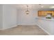 Open-concept dining area with updated floors and views into the updated kitchen at 19 Pistachio Loop # G, Murrells Inlet, SC 29576
