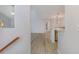 Hallway with wood-look floors and stairs to another floor at 19 Pistachio Loop # G, Murrells Inlet, SC 29576