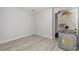 Empty room with disassembled appliance, wood-look floors and a closet at 19 Pistachio Loop # G, Murrells Inlet, SC 29576