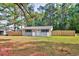 A cute single story house with a fenced yard, offering privacy and outdoor space at 2939 King St., Loris, SC 29569