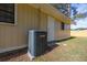 Exterior side view of home showing AC unit, and back door at 2939 King St., Loris, SC 29569