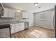 Bright kitchen featuring ample countertop space, white cabinets, stainless steel appliances, and window at 2939 King St., Loris, SC 29569
