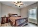 Bedroom with dark wood furniture, including a bed frame and two nightstands at 311 Las Olas Dr., Myrtle Beach, SC 29577