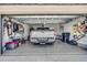Garage view featuring a truck, tools, and ample storage space, showcasing functionality and organization at 311 Las Olas Dr., Myrtle Beach, SC 29577
