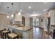 Eat-in Kitchen features granite countertops, stainless appliances, and pendant lighting over a breakfast bar at 311 Las Olas Dr., Myrtle Beach, SC 29577
