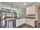Bright kitchen with stainless steel appliances, granite countertops, and an island with sink at 311 Las Olas Dr., Myrtle Beach, SC 29577