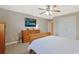 Bedroom with light wood furnishings, plush carpeting, and a ceiling fan at 4017 Chalmers Ct., Myrtle Beach, SC 29579