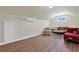 Bonus room with neutral walls, and couches has a light and airy feel at 4017 Chalmers Ct., Myrtle Beach, SC 29579
