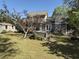 Expansive backyard with a deck, comfortable seating, and a charming shed for extra storage at 7 Pine Valley Ln., Surfside Beach, SC 29575