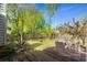 Scenic backyard with a wooden deck, perfect for relaxation and enjoying the serene outdoor environment at 7 Pine Valley Ln., Surfside Beach, SC 29575
