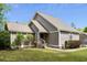 Attractive home with a well-maintained lawn, landscaped front yard, and stylish architectural details at 7 Pine Valley Ln., Surfside Beach, SC 29575