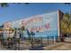 Colorful Surfside Beach mural with outdoor seating area at 7 Pine Valley Ln., Surfside Beach, SC 29575
