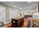 Spacious kitchen island with granite countertops, offering additional workspace and storage in an open-concept design at 7 Pine Valley Ln., Surfside Beach, SC 29575