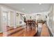 Open concept living and dining area with hardwood floors and ample natural light at 7 Pine Valley Ln., Surfside Beach, SC 29575