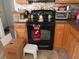 Kitchen area showing stove and cabinetry at 819 Brookline Dr., Myrtle Beach, SC 29579