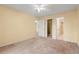 Comfortable bedroom featuring a ceiling fan, closet and doorway to the Primary bathroom at 820 Fairway Dr. # 1506Hh, Longs, SC 29568