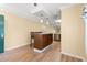 Spacious kitchen with center island and open layout to dining area, offering ample space and storage at 820 Fairway Dr. # 1506Hh, Longs, SC 29568