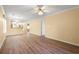 Open living room with wood flooring, offering an inviting and spacious atmosphere at 820 Fairway Dr. # 1506Hh, Longs, SC 29568