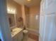 Clean bathroom features a shower-tub combo and bright vanity lighting at 901-9 West Port Dr. # 907, North Myrtle Beach, SC 29582