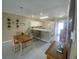 Open concept dining room with adjacent kitchen and breakfast bar at 901-9 West Port Dr. # 907, North Myrtle Beach, SC 29582