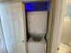 Laundry closet featuring a stacked washer and dryer at 901-9 West Port Dr. # 907, North Myrtle Beach, SC 29582
