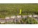 Aerial view of homes surrounded by lush trees in a serene setting at 932 Jackline Place # 103, Murrells Inlet, SC 29576