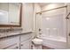Traditional-style bathroom featuring a shower-tub combination, tile floor, and vanity with mirror at 932 Jackline Place # 103, Murrells Inlet, SC 29576