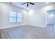 Spacious bedroom with hardwood floors and a window for lots of natural light at 932 Jackline Place # 103, Murrells Inlet, SC 29576