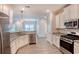 Well-equipped kitchen with granite countertops, stainless steel appliances, and ample cabinet space at 932 Jackline Place # 103, Murrells Inlet, SC 29576