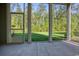 View of the outdoor greenery from this home's screened-in patio at 932 Jackline Place # 103, Murrells Inlet, SC 29576