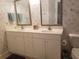 Bathroom with a white double sink vanity and toilet at 1000 Ray Costin Way # 108, Murrells Inlet, SC 29576