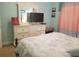 Bedroom with a white dresser and a TV at 1000 Ray Costin Way # 108, Murrells Inlet, SC 29576