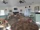 Spacious room with multiple tables and chairs, ideal for community gatherings and events at 1000 Ray Costin Way # 108, Murrells Inlet, SC 29576