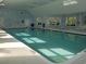 Indoor swimming pool featuring a bright, spacious area with ample seating and natural light at 1000 Ray Costin Way # 108, Murrells Inlet, SC 29576