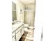Well-lit bathroom with a glass-enclosed shower, granite vanity, and modern fixtures at 103 Club Circle # 1-1, Pawleys Island, SC 29585