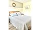 Serene bedroom featuring a comfortable bed, soft lighting, and tasteful decor at 103 Club Circle # 1-1, Pawleys Island, SC 29585