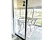 Enclosed patio with a table and chairs, ideal for enjoying the outdoor view at 103 Club Circle # 1-1, Pawleys Island, SC 29585