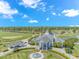 Aerial view of a clubhouse featuring a fountain, landscaping and golf course in the background at 1033 World Tour Blvd. # 203, Myrtle Beach, SC 29579