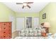 Relaxing bedroom with a ceiling fan, closet, and easy access to the en-suite bathroom at 1033 World Tour Blvd. # 203, Myrtle Beach, SC 29579