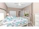 Bright bedroom featuring closet space, bed and a dresser with a television, providing ample storage and entertainment at 1033 World Tour Blvd. # 203, Myrtle Beach, SC 29579