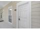 Inviting condo front door with secure entry and unit number, offering a welcoming entrance at 1033 World Tour Blvd. # 203, Myrtle Beach, SC 29579