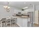Kitchen and dining area showcasing granite counters, stainless appliances and white cabinetry at 1033 World Tour Blvd. # 203, Myrtle Beach, SC 29579
