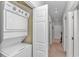 Convenient laundry area featuring a stacked washer and dryer, maximizing space and functionality at 1033 World Tour Blvd. # 203, Myrtle Beach, SC 29579