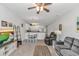 Inviting living room with neutral tones, open to dining area and kitchen, creating a seamless and airy space at 1033 World Tour Blvd. # 203, Myrtle Beach, SC 29579