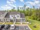 An aerial view of townhomes with ample parking and lush green surroundings in a desirable community at 1105 Dinger Ct. # 1105, Myrtle Beach, SC 29588